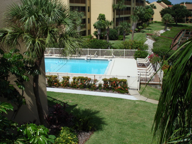 View of partial bayside Pool Area from the Lanai of Midnight Cove #532.